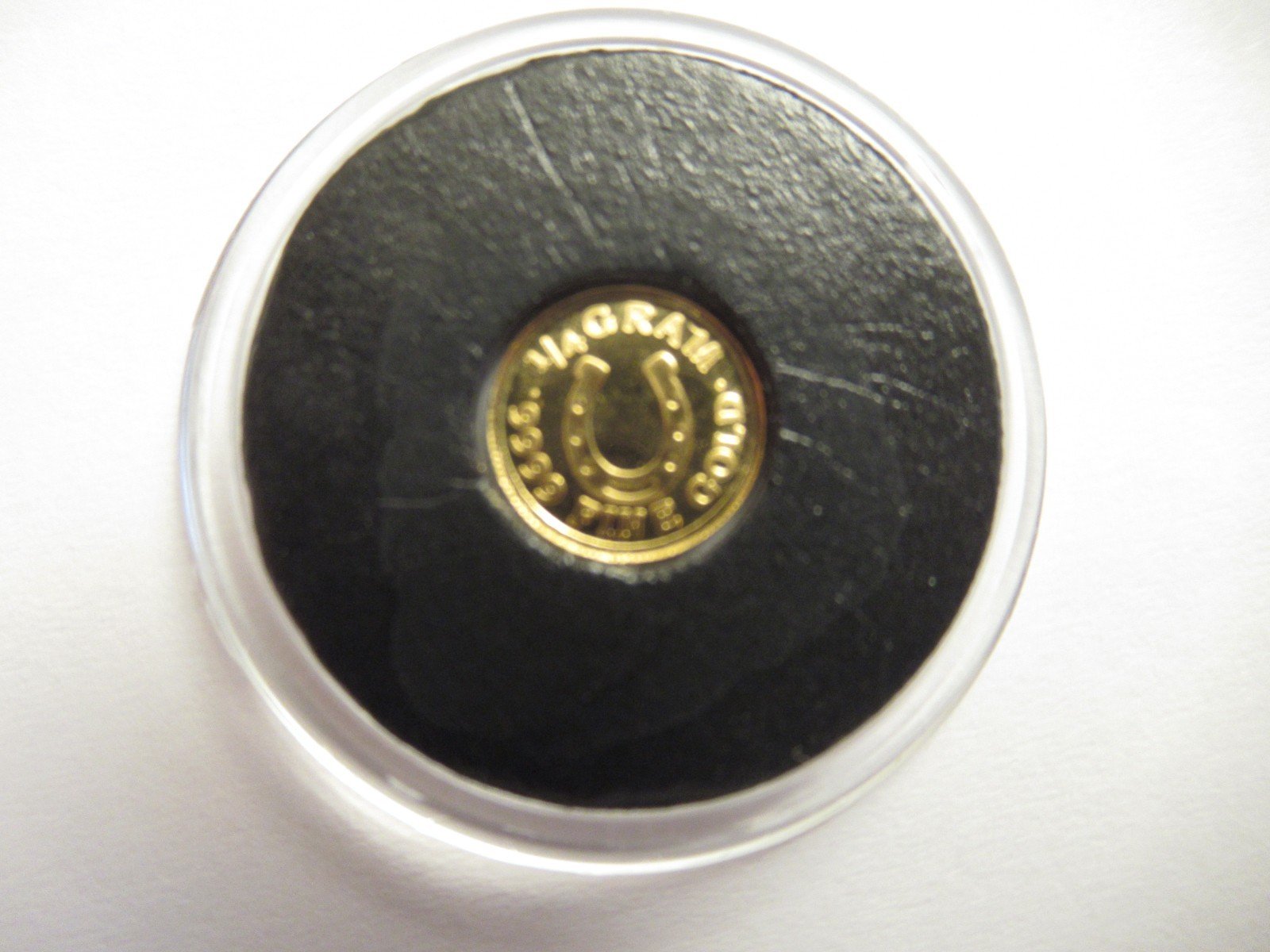 Monarch Precious Metals 1/4 gram .9999 gold, w/ capsule Horseshoe design